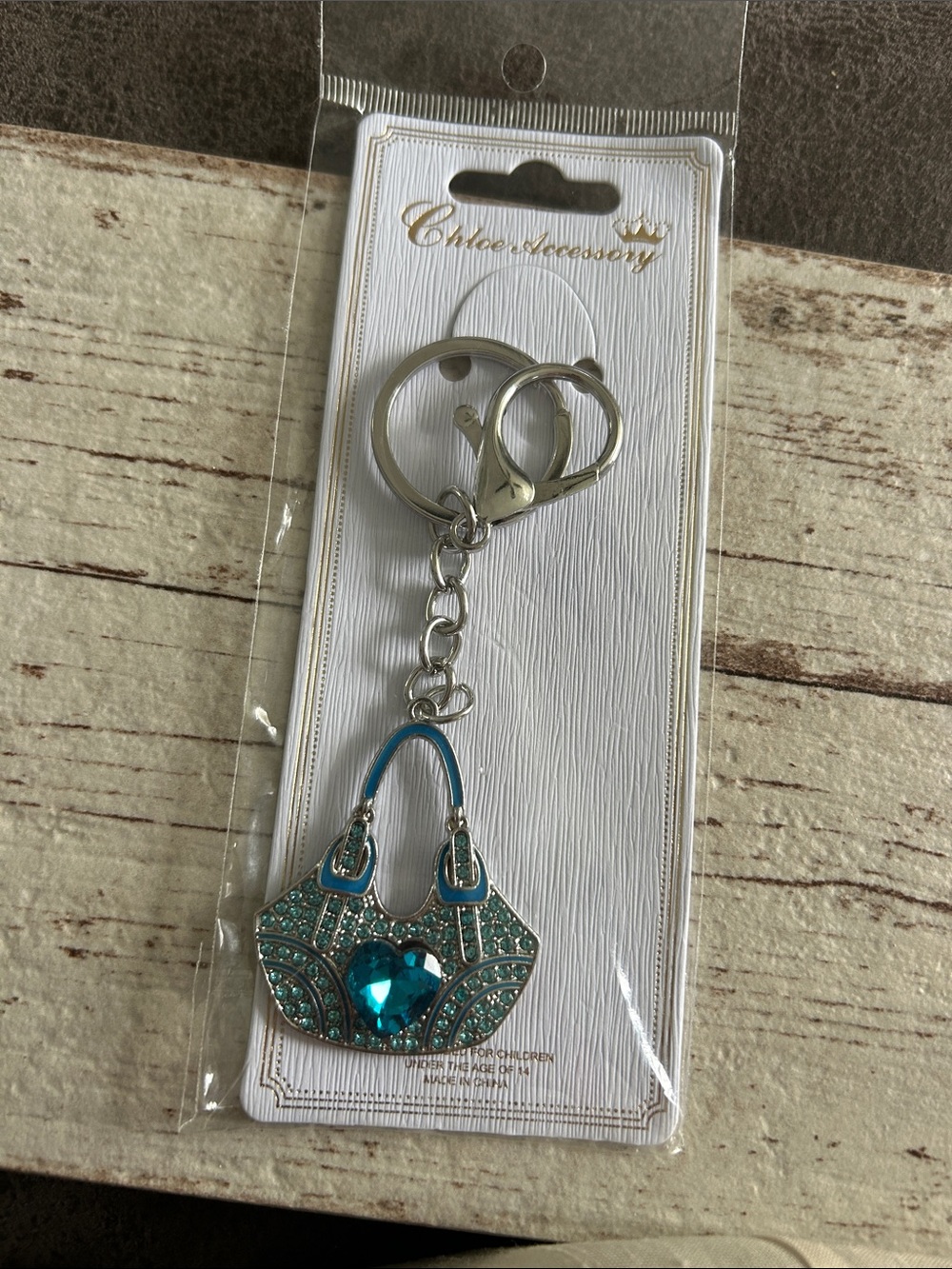 5/)25 Teal Crystal Handbag Keychain